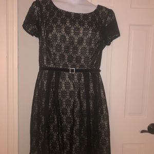 Black lace over gold belted skater dress